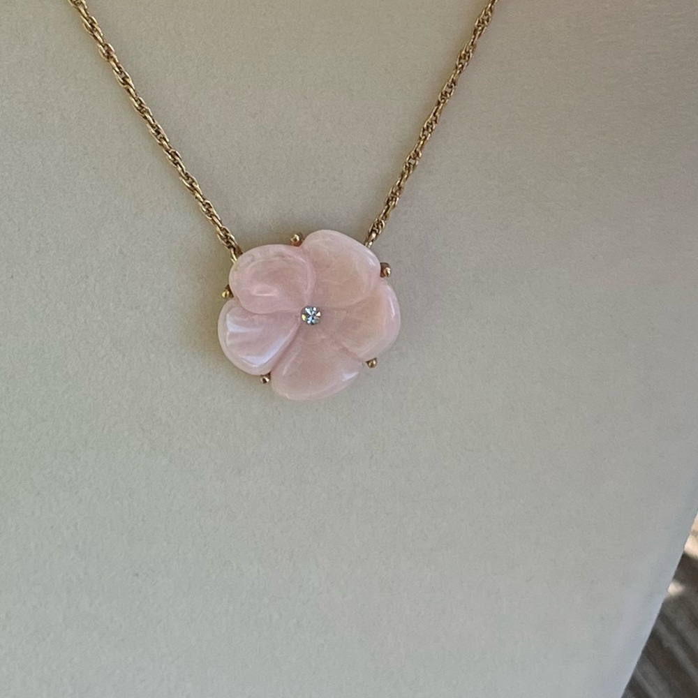 Avon pink flower necklace.